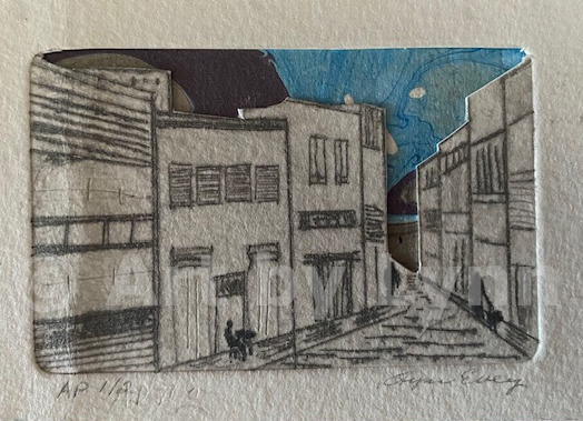 Dry point of a person at a table alone in a city scene.